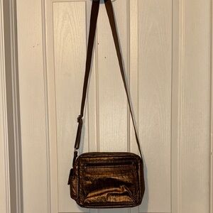 Mila Nova Crossbody Bag. Multiple compartments to store all your necessities.